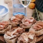 Sliced Raw Meat on Brown Wooden Chopping Board